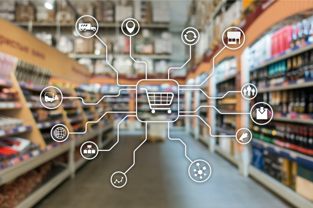 Retail marketing channels E-commerce Shopping automation concept on blurred supermarket background.